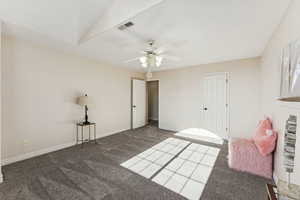 Bedroom featuring carpet flooring and ceiling fan