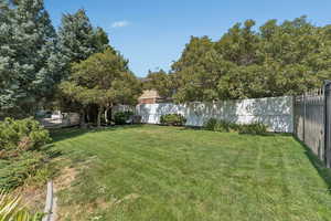 View of fenced backyard