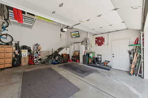Garage featuring a garage door opener