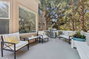 View of patio featuring outdoor lounge area and area for grilling