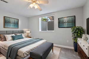 VIRTUALLY STAGED Bedroom with carpet flooring and a ceiling fan