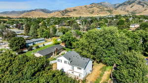 Aerial perspective of suburban area featuring mountains
