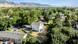 Aerial view of residential area with a mountain backdrop