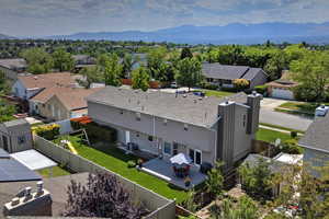 Aerial view of residential area with a mountain backdrop