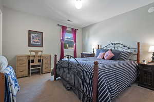 View of carpeted bedroom