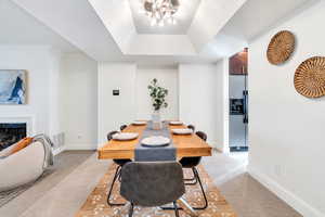 Spacious dining room with tray ceiling