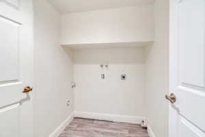 Large laundry room with utility closet