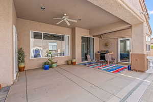 View of patio / terrace featuring ceiling fan and a grill