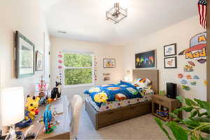 Bedroom with carpet flooring