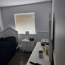 Bedroom featuring wood finished floors