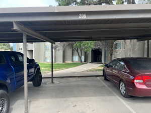 Park in #206, walk straight ahead upstairs to the top floor.