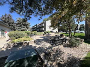 View of home's community featuring a yard