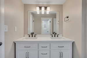 Bathroom featuring double vanity