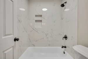 Bathroom with toilet and  shower combination