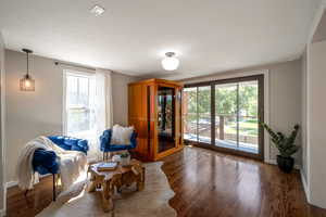 Living area with wood finished floors