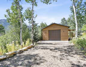 Detached garage with driveway