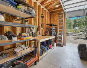 Garage featuring a workshop area