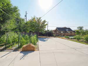 Fenced backyard featuring a patio area