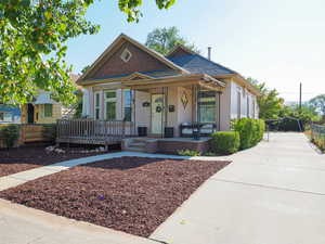 Victorian-style house with covered porch