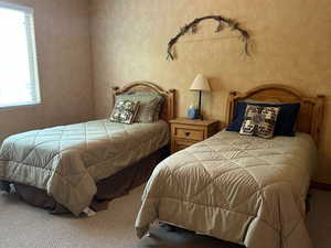 Bedroom with carpet floors