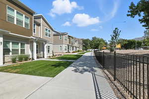 View of road featuring street lighting and a residential view