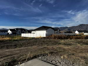View of yard featuring a mountain view and a residential view
