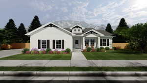 Modern inspired farmhouse featuring board and batten siding and a mountain view