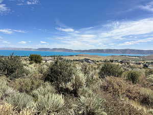 Mountain view featuring a nearby body of water