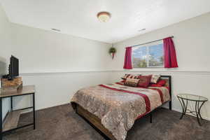 Bedroom featuring carpet flooring