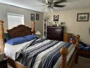 Bedroom featuring a ceiling fan