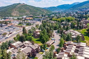 Aerial view of residential area with a mountainous background