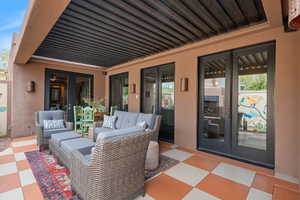 View of patio / terrace featuring french doors and outdoor lounge area