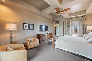 Bedroom with coffered ceiling, carpet, access to outside, beamed ceiling, and ceiling fan