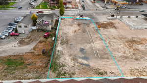 Aerial view of residential area with property parcel outlined