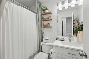 Full Bathroom  Tub Shower and larger vanity with quartz top