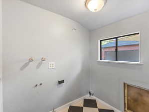 Laundry area with gas and electric dryer hookup