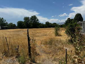 View of yard with a view of countryside