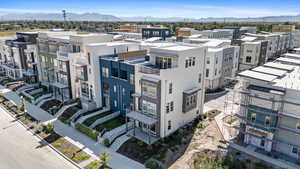 Aerial view of residential area with mountains
