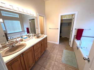 Master bath w/ walk in closet.  There is a window in the closet currently covered by the wardrobe