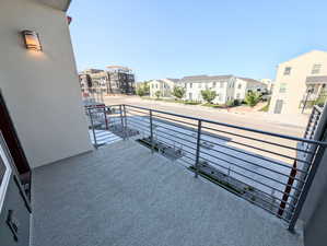 Balcony featuring a residential view