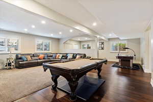 Rec room featuring pool table, dark wood-type flooring, beamed ceiling, and recessed lighting
