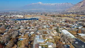 View of property location with nearby suburban area and mountains