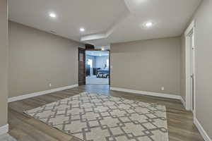 Unfurnished room featuring recessed lighting and wood finished floors