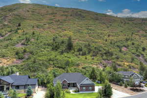 View from above of property featuring a mountain backdrop