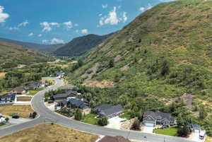 Aerial view of residential area featuring mountains