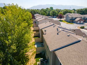 Aerial view of residential area with a mountainous background