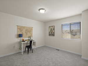 Office featuring carpet and baseboards