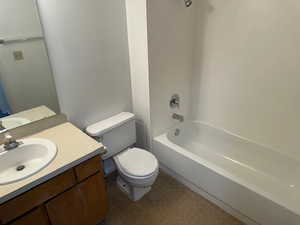 Full bathroom featuring vanity,  shower combination, and tile patterned floors