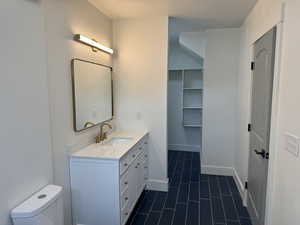 Bathroom featuring vanity and tile patterned floors