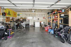 Garage featuring refrigerator